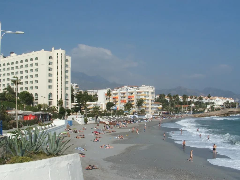 Torrecilla Beach, Nerja: Sand, Shelter and Getting There
