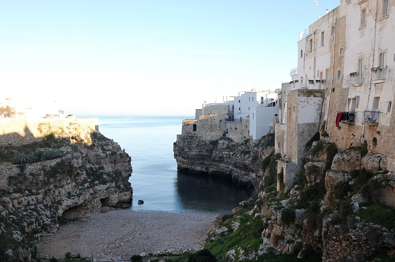 POL - Lama Monachile beach and cliffs in Polignano a Mare, Italy, Bari
