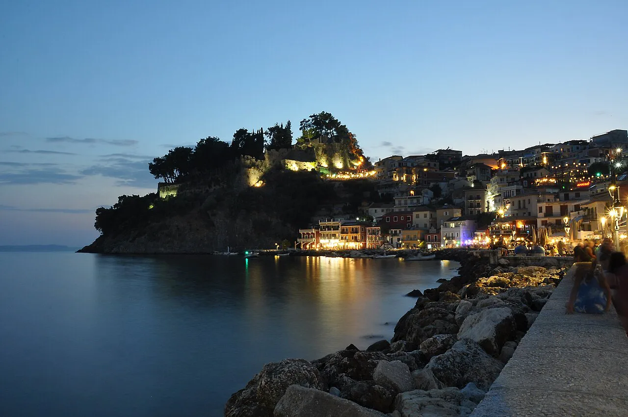 Parga harbour and castle at night