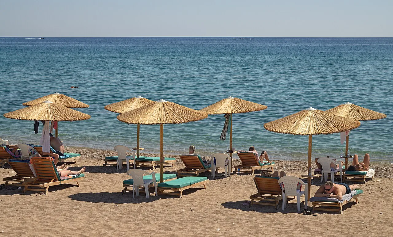 Golden umbrellas. Stegna, Rhodes, Greece